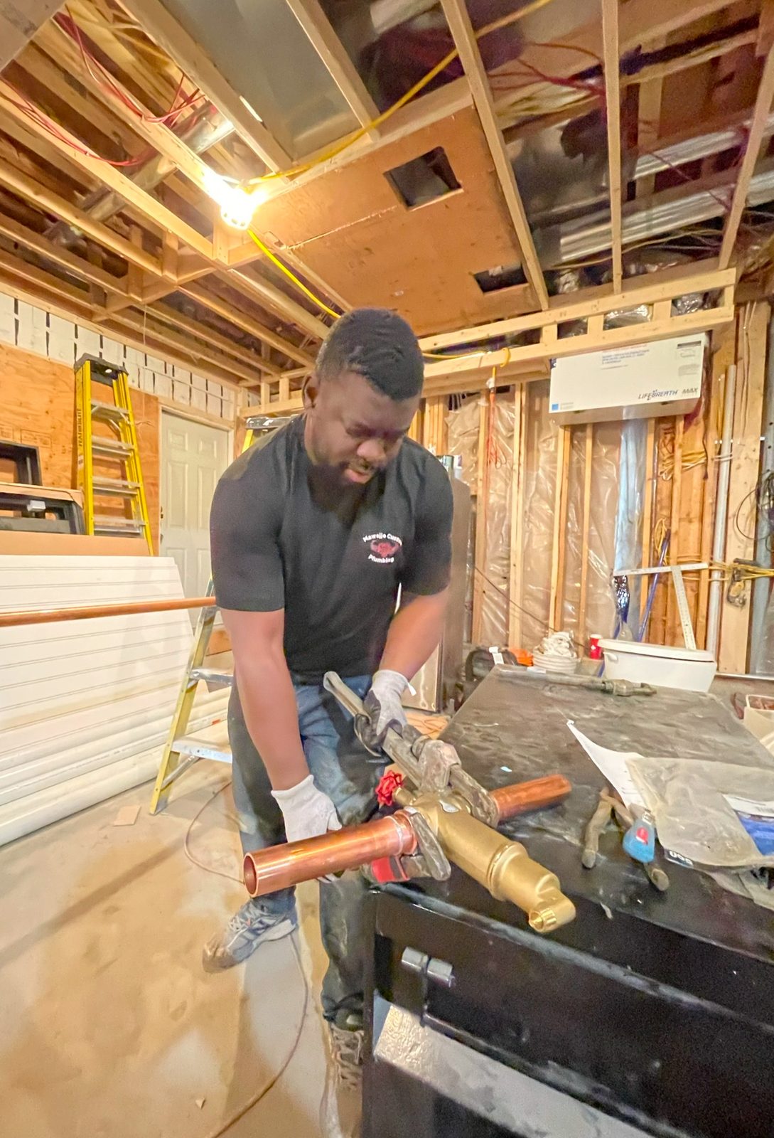 Mawejje Custom Plumbing — licensed Winnipeg Manitoba plumber on the job: emergency plumbing repairs, 24/7 plumbing contractors, residential plumbers, commercial plumbing companies, drain and pipe installation.